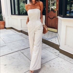Ali & Jay Strapless Lace Up Flared Jumpsuit